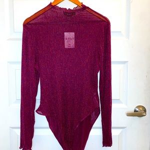 Metallic see through body suit